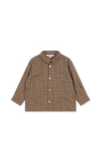 Front view of the Konges Sløjd Foret Long-sleeve Shirt in Chocolate Check on a white background.