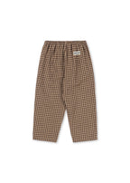 Back view of the Konges Sløjd Foret Pants in Chocolate Check on a white background.
