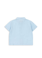 Back view of a Konges Sløjd Fran shirt in blue check on a white background