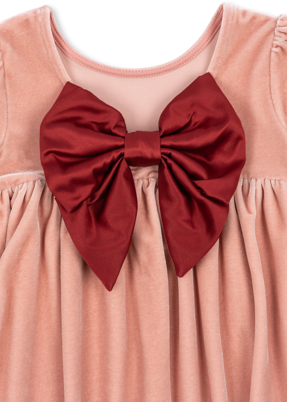 Close-up of the Konges Sløjd Gia Bow Dress in Mellow Rose on a white background.