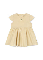Front view of the Konges Sløjd Hearly dress in Sea mist on a white background