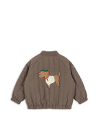 Back view of the Konges Sløjd Juno Terry Bomber jacket in Walnut on a white background.