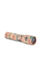 Side view of the Konges Sløjd Kaleidoscope in Like Cats and Dogs print on a white background.