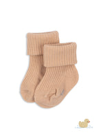 Konges Sløjd Lana light knitted socks in cameo rose on a white background