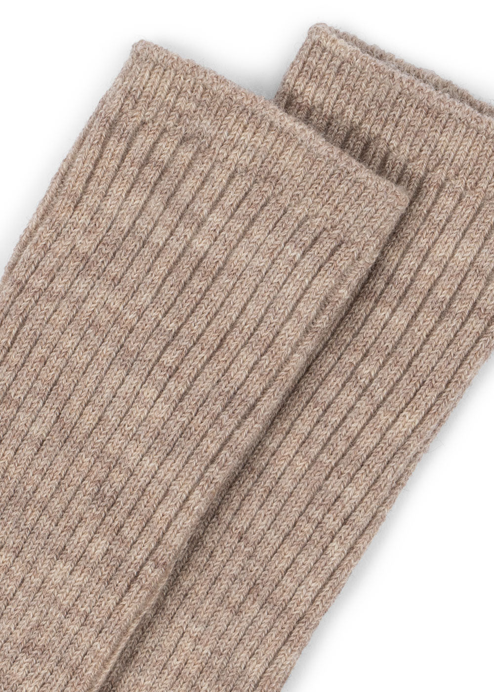 Close-up of Konges Sløjd Lana light knitted socks in sheer bliss on a white background