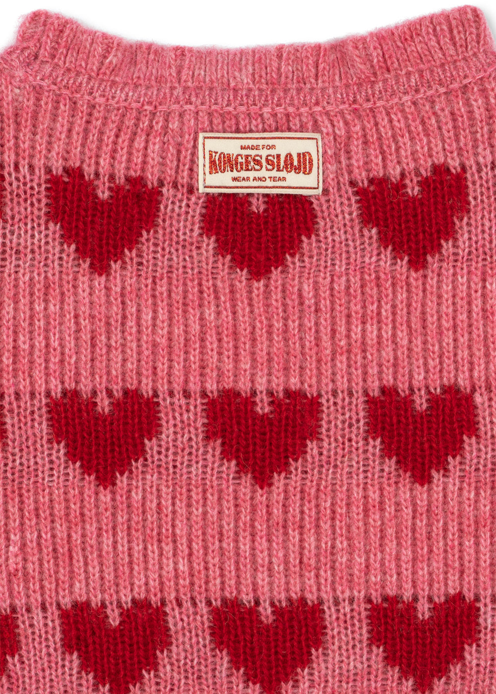 Close-up of the Konges Sløjd Laula Sweater in Heart print on a white background.