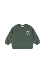 Front view of the Konges Sløjd Lou sweat shirt in Cilantro on a white background