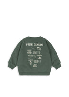 Back view of the Konges Sløjd Lou sweat shirt in Cilantro on a white background