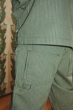 Close-up of the Konges Sløjd Luc Pants and Shirt Jacket in Milk Verte Stripe.
