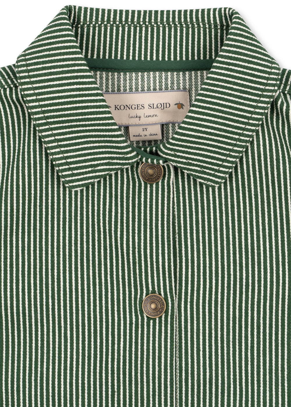 Close-up of the Konges Sløjd Luc Shirt Jacket in Milk Verte Stripe print on a white background.