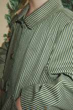 Close-up of the Konges Sløjd Luc Shirt Jacket in Milk Verte Stripe print on a white background.
