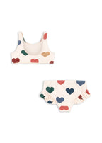 Back view of the Konges Sløjd Manuca bikinis in Bon coeur coloré on a white background