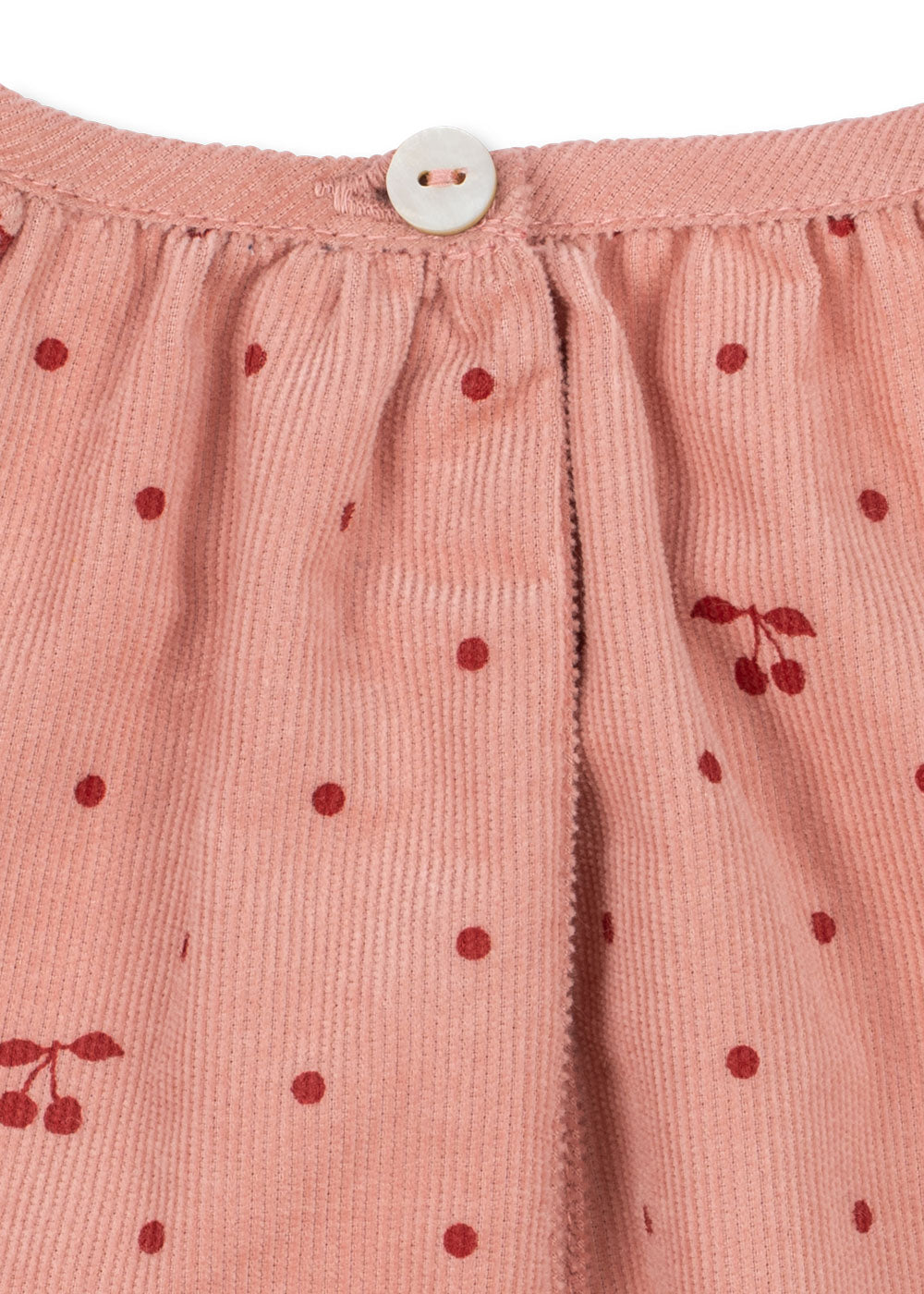 Close-up of the Konges Sløjd Marlo Dress in Cherry Dot Scarlet print on a white background.