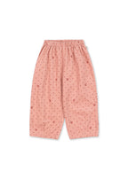 Front view of the Konges Sløjd Marlo pants in Cherry Dot Scarlet print on a white background.