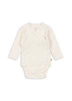 Konges Sløjd Minnie newborn body in Antique white, front view on a white background