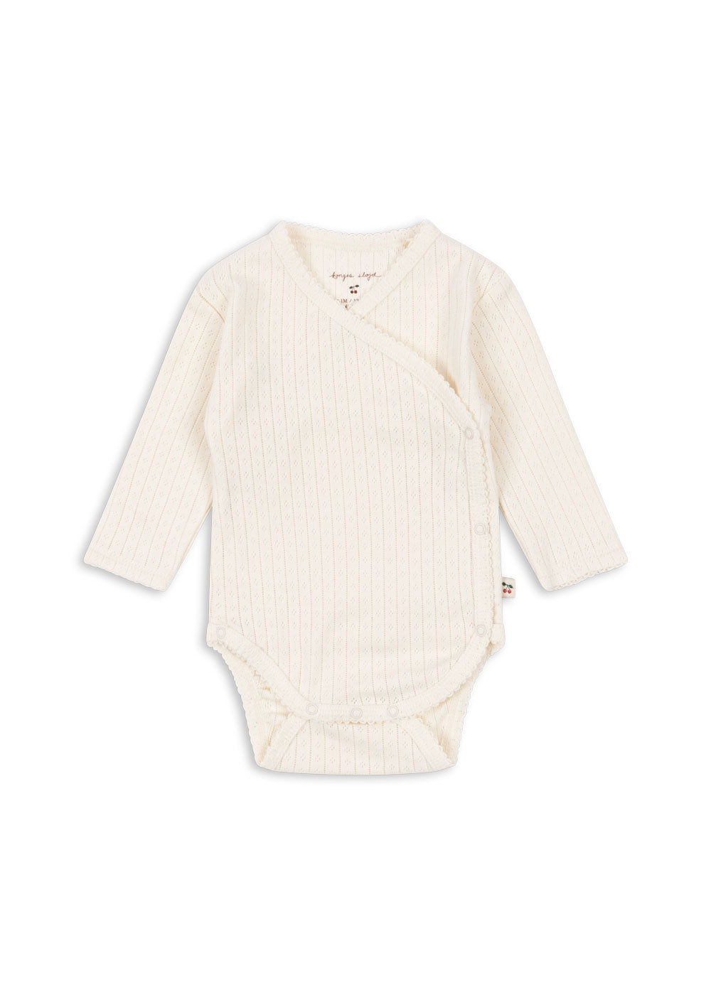Konges Sløjd Minnie newborn body in Antique white, front view on a white background