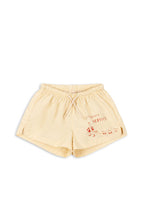 Front view of the Konges Sløjd Pomio short swim shorts in banana crepe on a white background