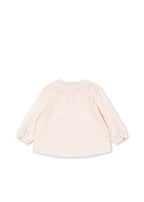 Back view of the Konges Sløjd Rilo Collar Shirt in Powder Puff on a white background.