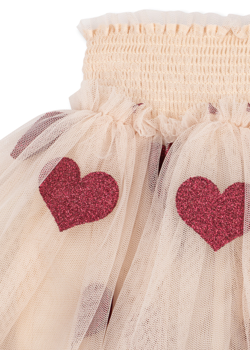 Close-up of the Konges Sløjd Tullie Smock skirt in Coeur Glitter on a white background.