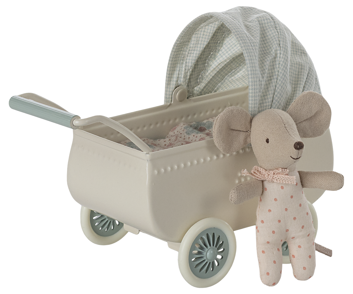 Maileg Baby Mouse styled in front of a Mint pram on a white background