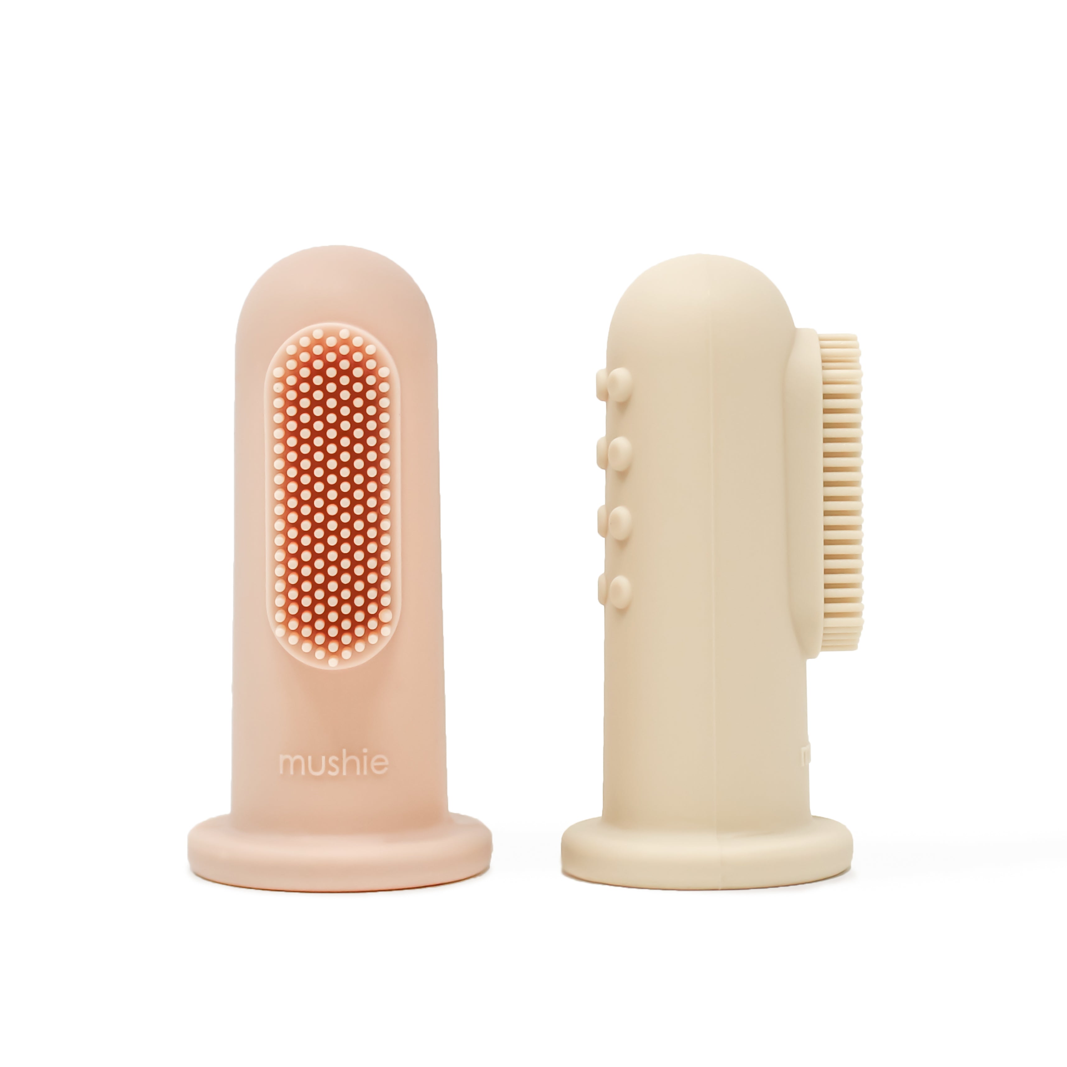 Mushie finger toothbrush set in Blush and Shifting sand on a white background