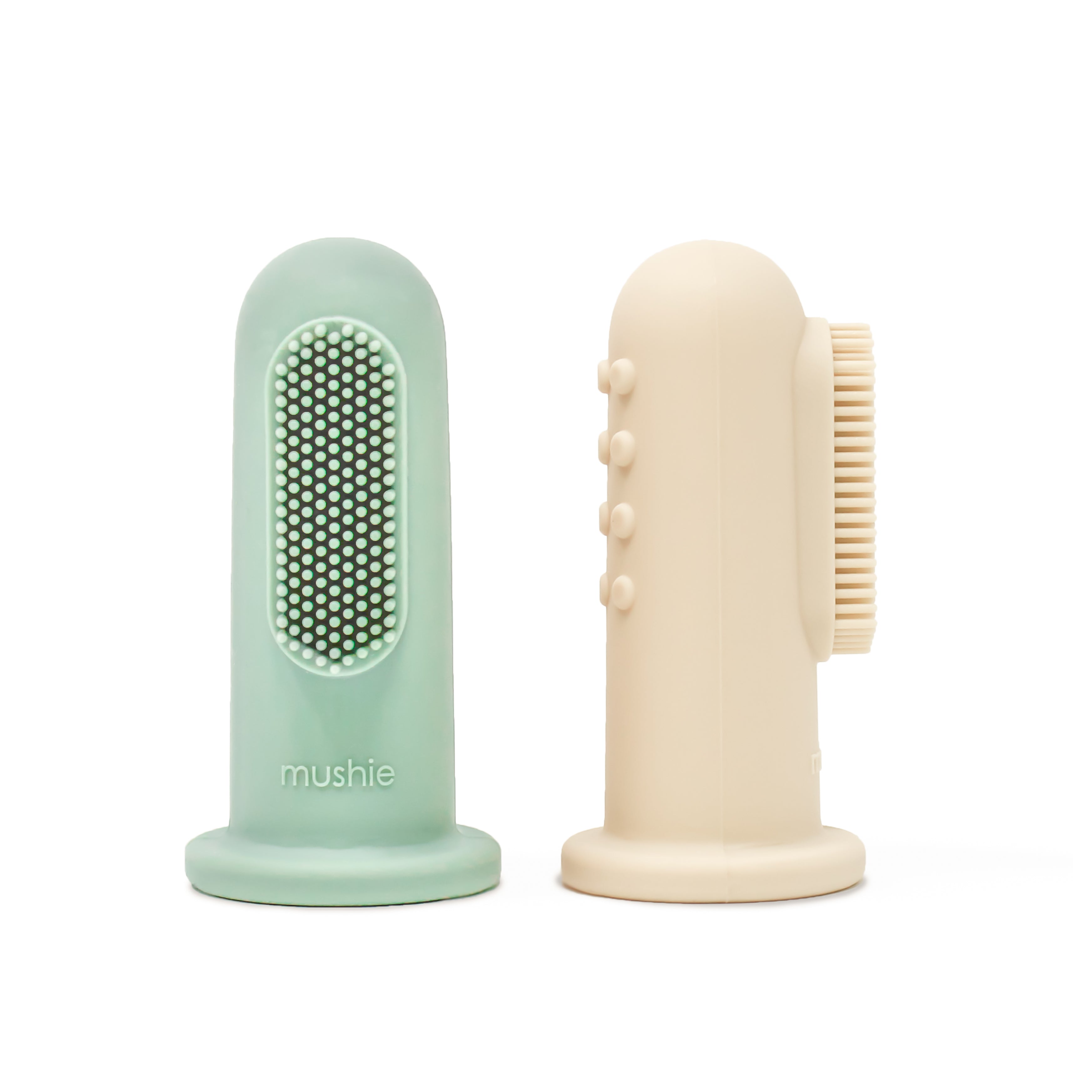 Mushie finger toothbrush set in Cambridge blue and Shifting sand on a white background