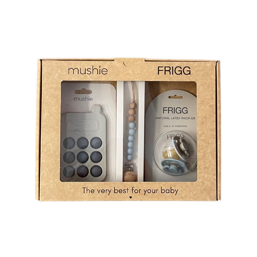 Mushie and Frigg giftbox in boy in original packagin on a white background