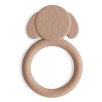 Back view of a Mushie silicone teether in Dog on a white background