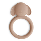 Front view of a Mushie silicone teether in Dog on a white background