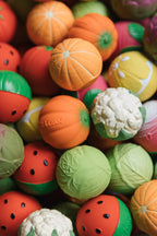 Oli & Carol Veggie Soup sensory balls set styled with other sensory balls (not included)