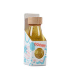 Petit Boum Golden sensory bottle displayed with original packaging