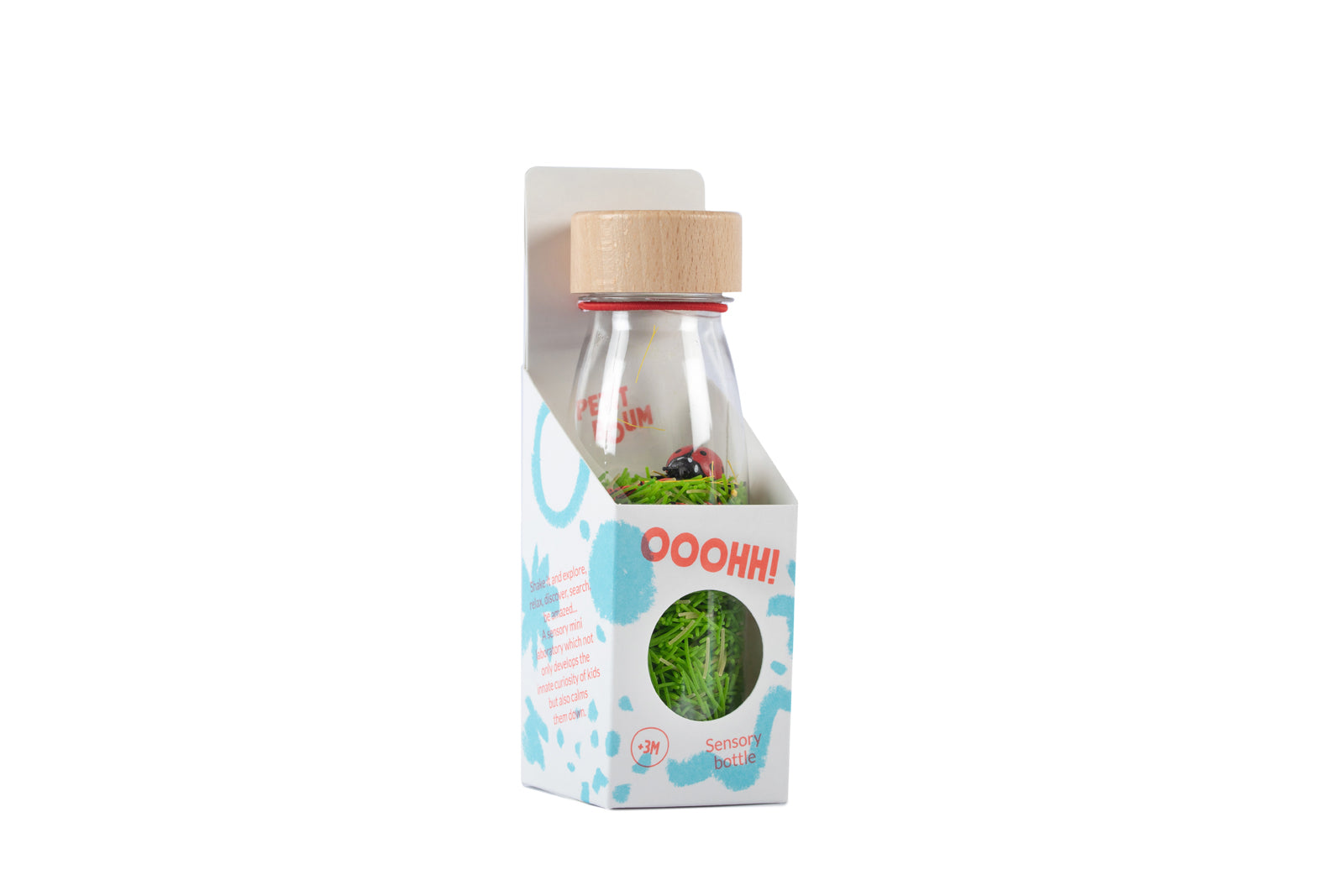 Petit Boum Ladybirds sensory bottle displayed with original packaging