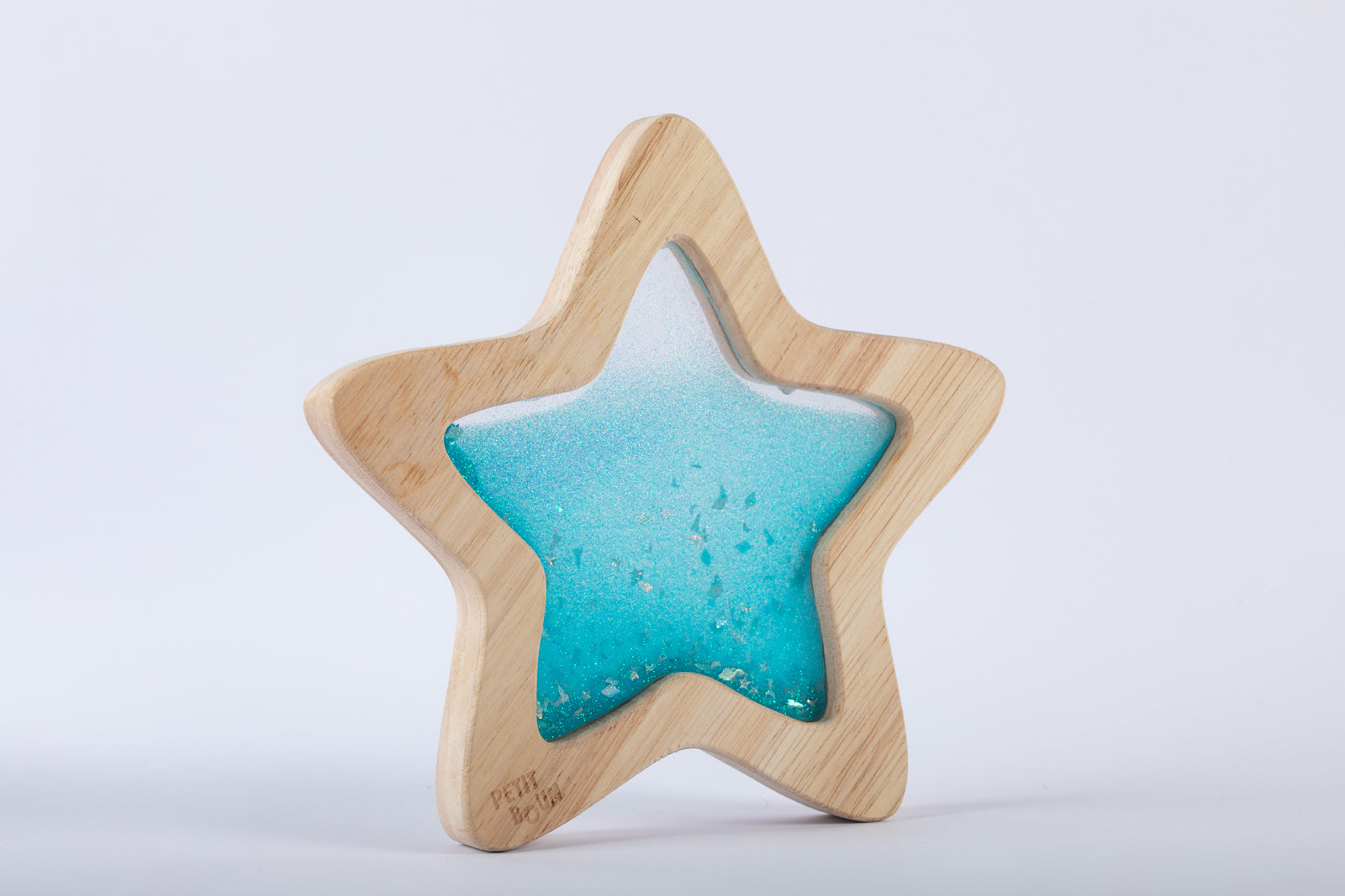 Petit Boum sensory star Orionis front-three-quarter view against a light gray background